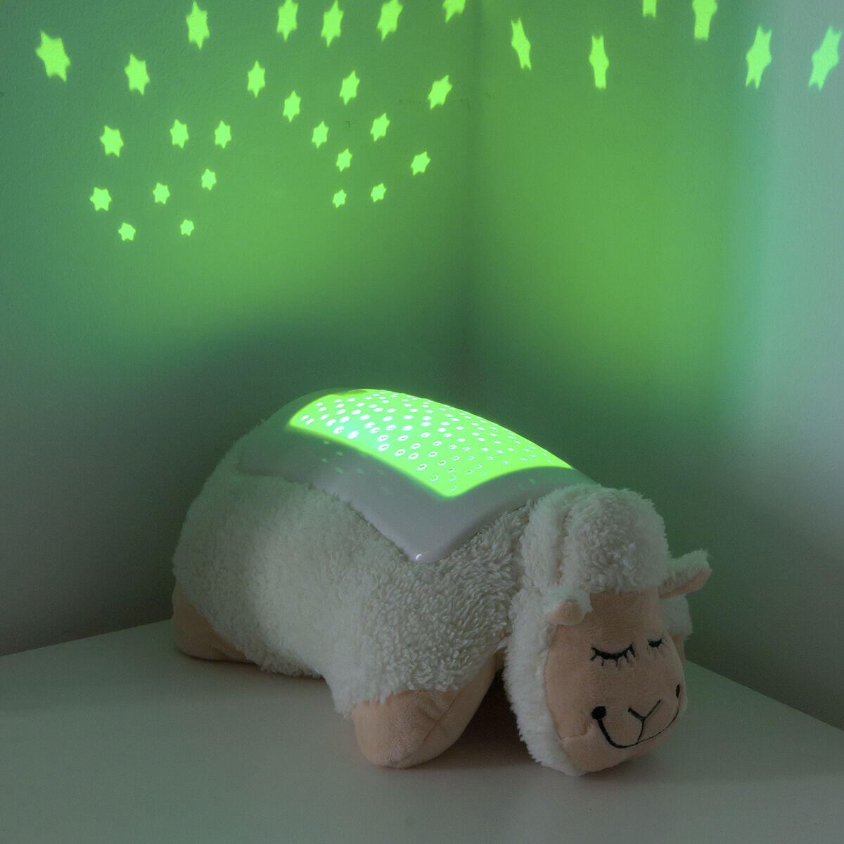 peluche con proyector de luces