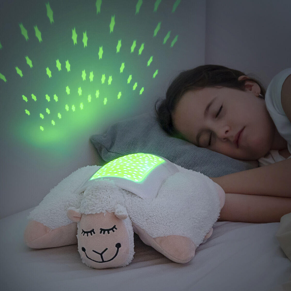 peluche con proyector de luces